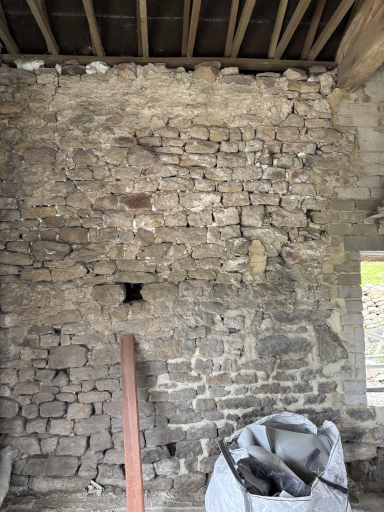 Taking everything back to solid stone masonry